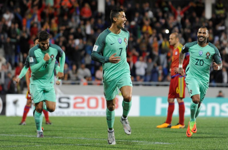 Portugalu00e2u20acu2122s Cristiano Ronaldo (centre) celebrates after scoring the first goal at the Estadi Nacional in Andorra October 8, 2017. u00e2u20acu2022 Reuters pic