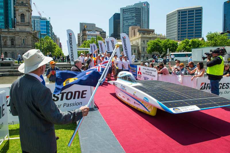 Crew members of the Belgian Punch Powertrain Solar Team at the 2015 World Solar Challenge. u00e2u20acu201d AFP pic