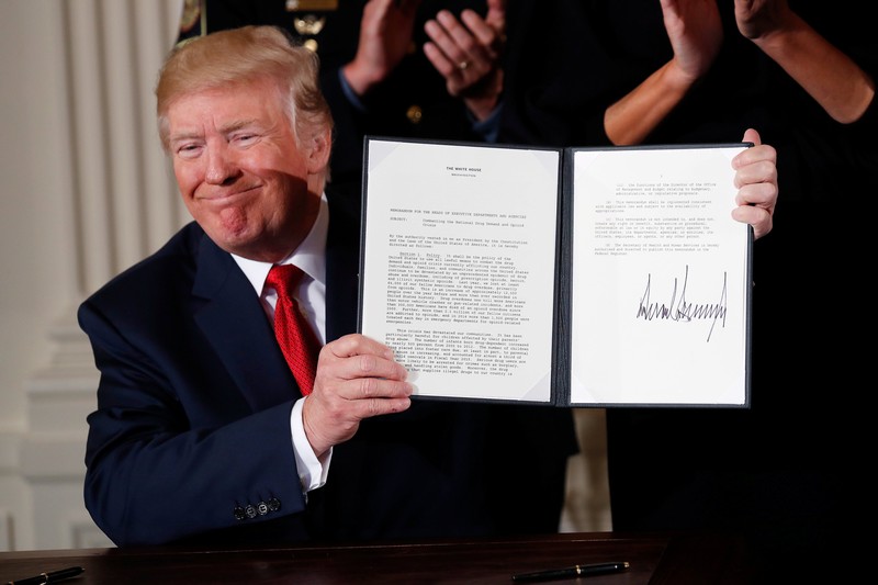US President Donald Trump displays a presidential public health emergency declaration on the nation's opioid crisis in the White House in Washington October 26, 2017. u00e2u20acu201d Reuters pic