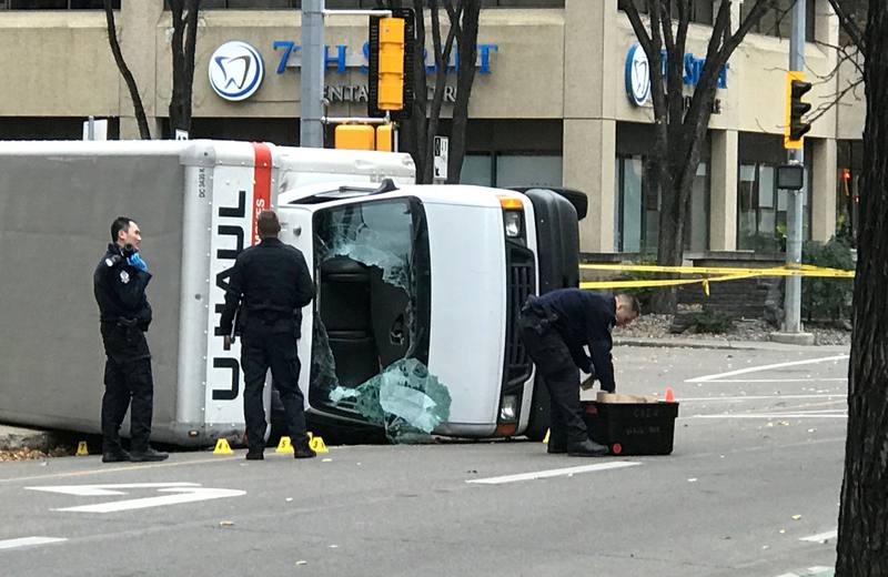 Edmonton police at the scene where a man hit pedestrians then flipped the U-Haul truck he was driving in Edmonton, Alberta October 1, 2017. u00e2u20acu201d Reuters pic 
