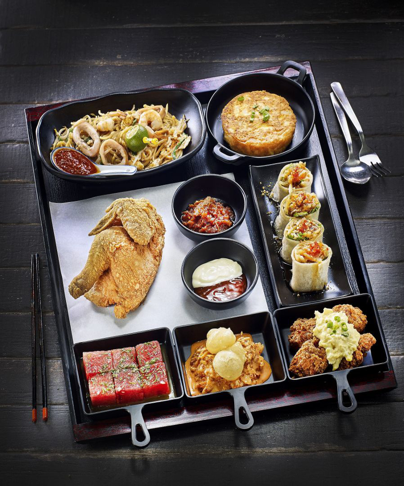 The sharing platter, Bao Ka Liao, will feature seven items including Tenderfresh Signature Fried Half Spring Chicken, Warong Kimu00e2u20acu2122s Hokkien Mee, and Ah Boyu00e2u20acu2122s Hokkien Popiah. u00e2u20acu201d Picture by Hawkerman via TODAY
