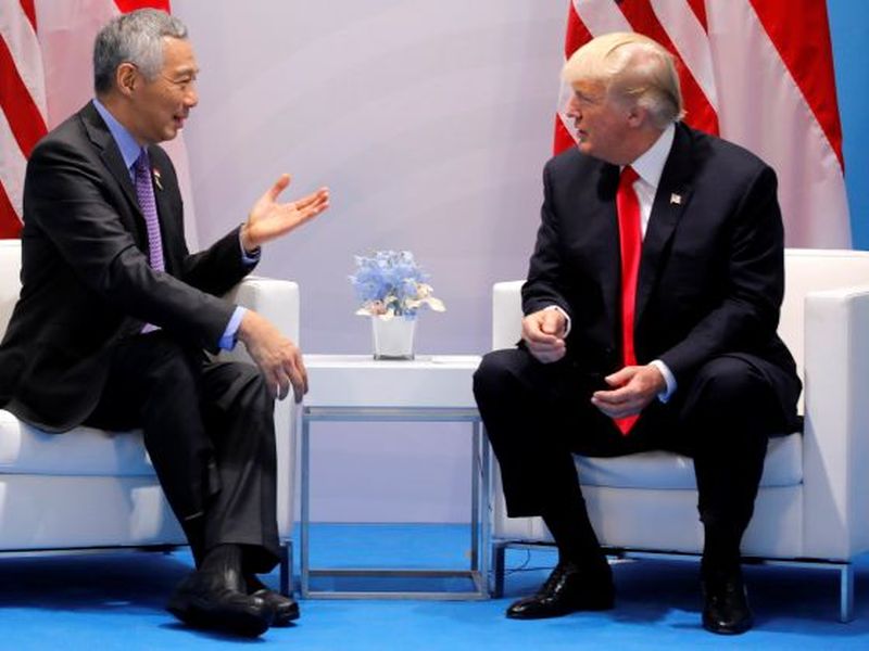 Singapore's Prime Minister Lee Hsien Loong talks with US President Donald Trump during the G20 leaders summit in Hamburg on July 8, 2017. u00e2u20acu2022 Reuters file pic