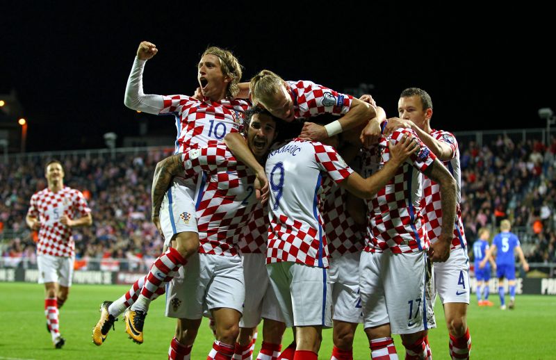 Croatia's Mario Mandzukic celebrates with teammates after scoring the first goal against Finland. u00e2u20acu2022 Reuters pic