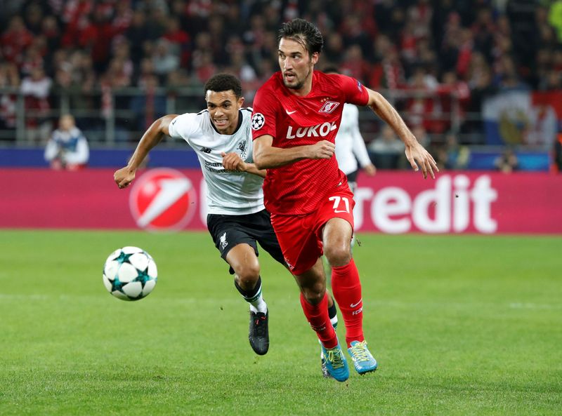 Spartak Moscowu00e2u20acu2122s Bulgarian player Ivelin Popov in action with Liverpoolu00e2u20acu2122s Trent Alexander-Arnold during their Champions League match in Moscow, September 26, 2017. u00e2u20acu201d Reuters pic