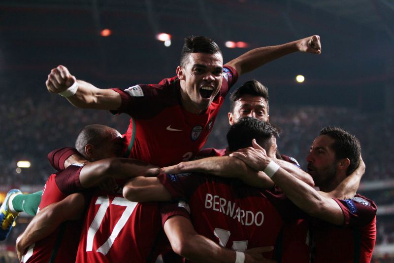 Portugal's players celebrate after Andre Silva scored the second goal against Switzerland. u00e2u20acu2022 Reuters pic