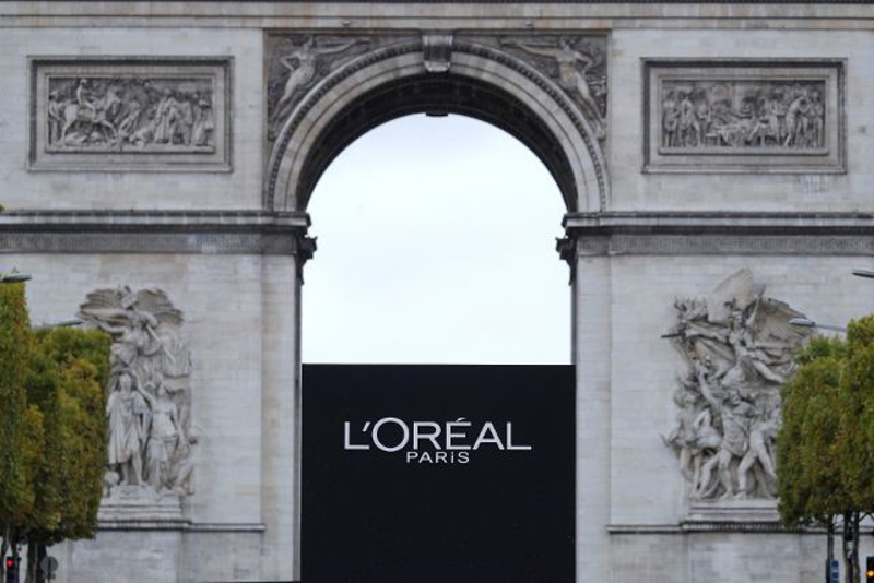The logo of French cosmetics group Lu00e2u20acu2122Oreal is seen in front of the Arc de Triomphe during a public event in Paris October 1, 2017. u00e2u20acu201d Reuters pic