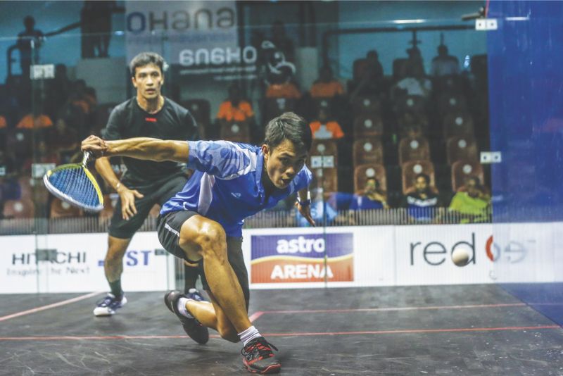 Sanjay Singh (left) keeps his u00e2u20acu02dcq-final dateu00e2u20acu2122 with compatriot Ivan Yuen but the Malaysian No. 2 proved superior to beat Sanjay 12-10, 11-5, 11-3 in the Ohana Malaysia Open at Bukit Jalil squash centre yesterday. u00e2u20acu201d Picture by Hari Anggara