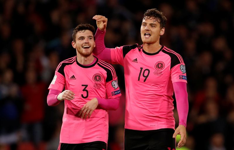 Scotlandu00e2u20acu2122s Andrew Robertson and Chris Martin celebrate after the match against Slovakia. u00e2u20acu2022 Reuters pic