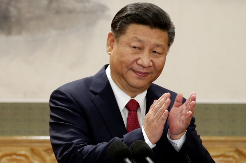 China's President Xi Jinping claps after his speech as he and other new Politburo Standing Committee members meet with the press at the Great Hall of the People in Beijing October 25, 2017. u00e2u20acu2022 Reuters pic