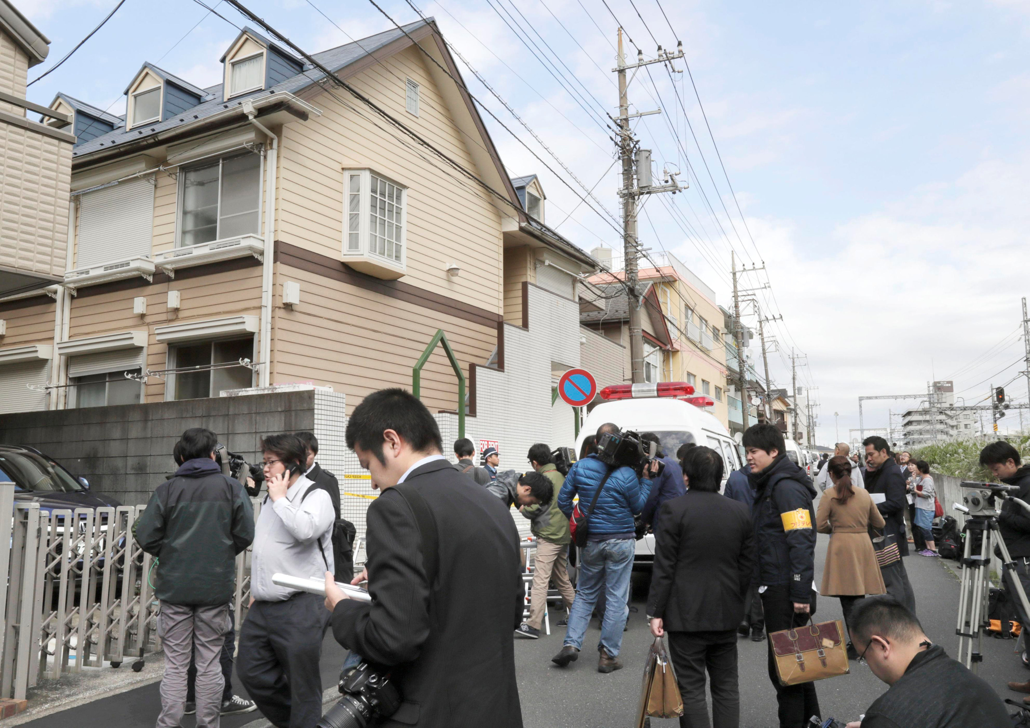 Members of the media gather in front of an apartment building where media reported nine bodies were found in Zama, Kanagawa Prefecture, Japan in this photo taken by Kyodo on October 31, 2017. u00e2u20acu201d Reuters pic 