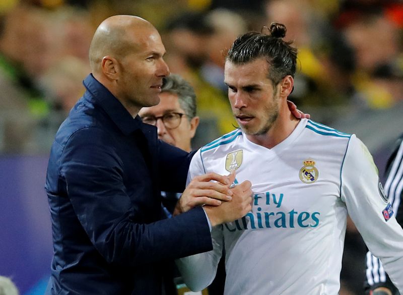 Real Madrid coach Zinedine Zidane shakes hands with Gareth Bale after he is substituted off during their Champions League match vs Borussia Dortmund at Westfalenstadion, Dortmund, Germany - September 26, 2017. u00e2u20acu201d Reuters pic