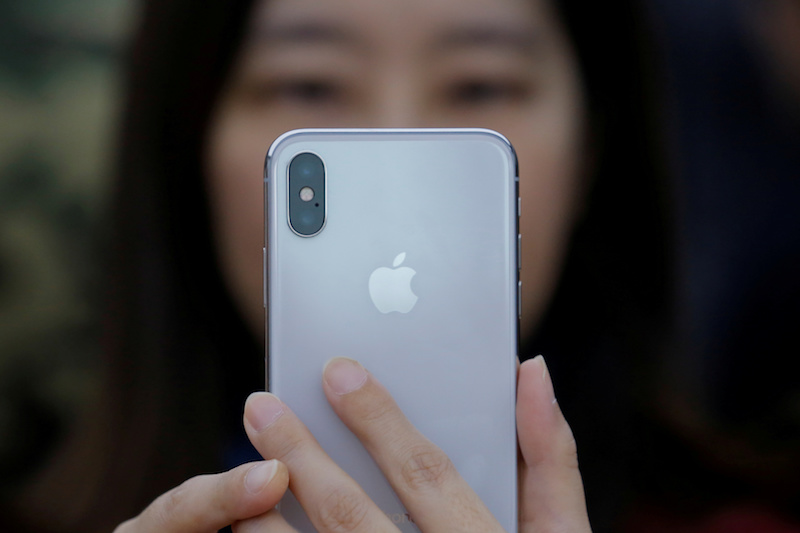 A attendee uses a new iPhone X during a presentation for the media in Beijing October 31, 2017.n u00e2u20acu201d Reuters pic 