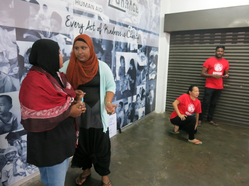 Rohingya refugee actors from the u00e2u20acu02dcRohingya Women Theatreu00e2u20acu2122 gesture during a performance in Kuala Lumpur September 17, 2017. u00e2u20acu201d Thomson Reuters Foundation pic