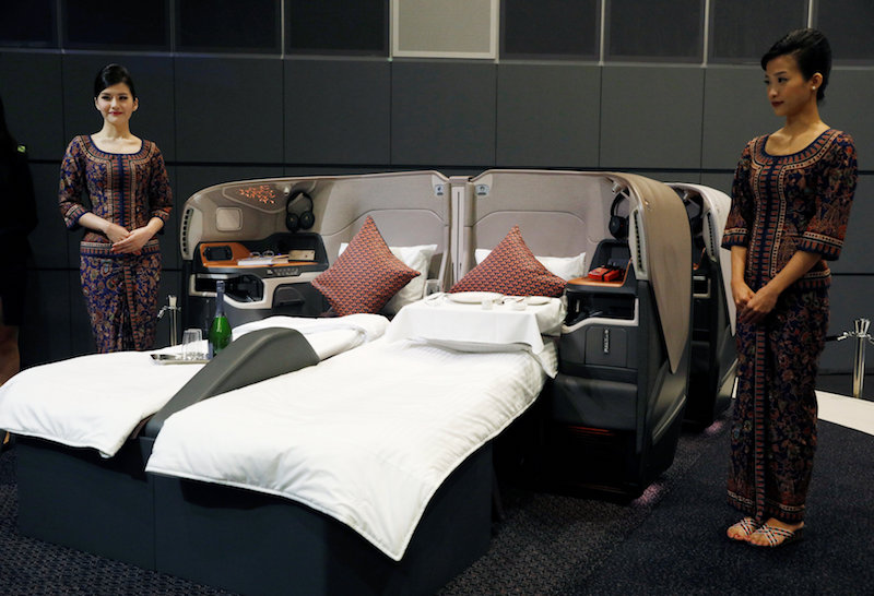 Flight attendants present the newly launched Business Class cabin during a Singapore Airlines event in Singapore November 2, 2017. u00e2u20acu201d Reuters pic