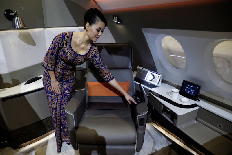 A flight attendant presents the newly launched First Class Suite cabin during a Singapore Airlines event in Singapore November 2, 2017. u00e2u20acu201d Reuters pic