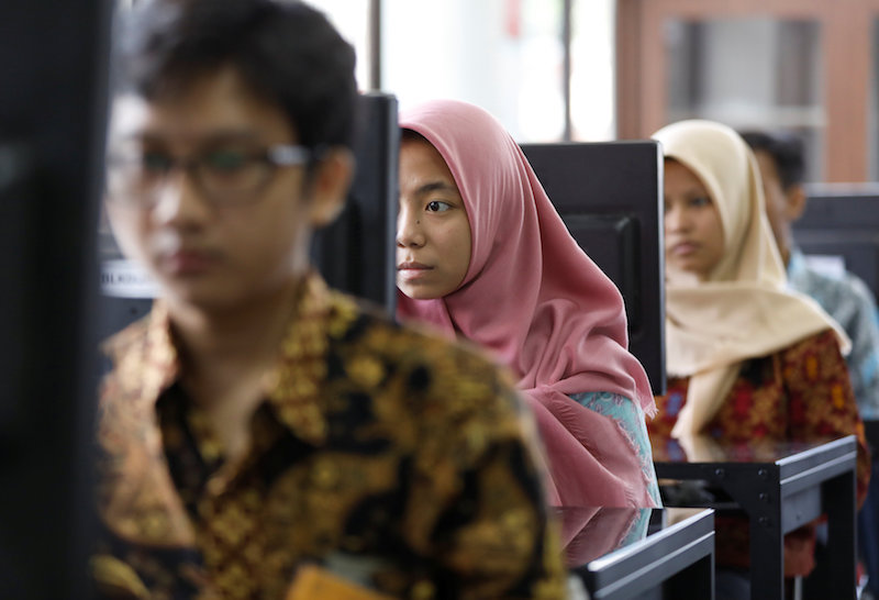Students at a government-run Vocational Training Centre study basic computer skills in Jakarta November 10, 2017. u00e2u20acu201d Reuters pic
