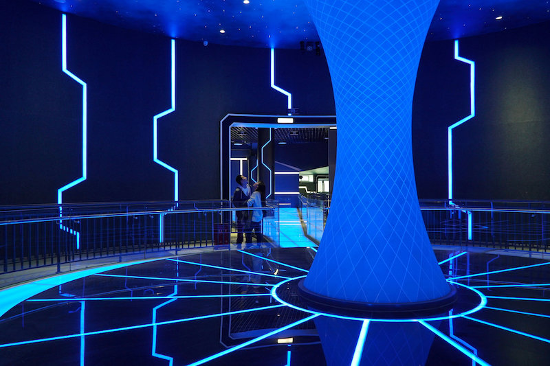 Staff members chat in the walkway leading up to a theme park ride, at the Oriental Science Fiction Valley theme park in Guiyang, Guizhou province, China November 24, 2017. — Reuters pic