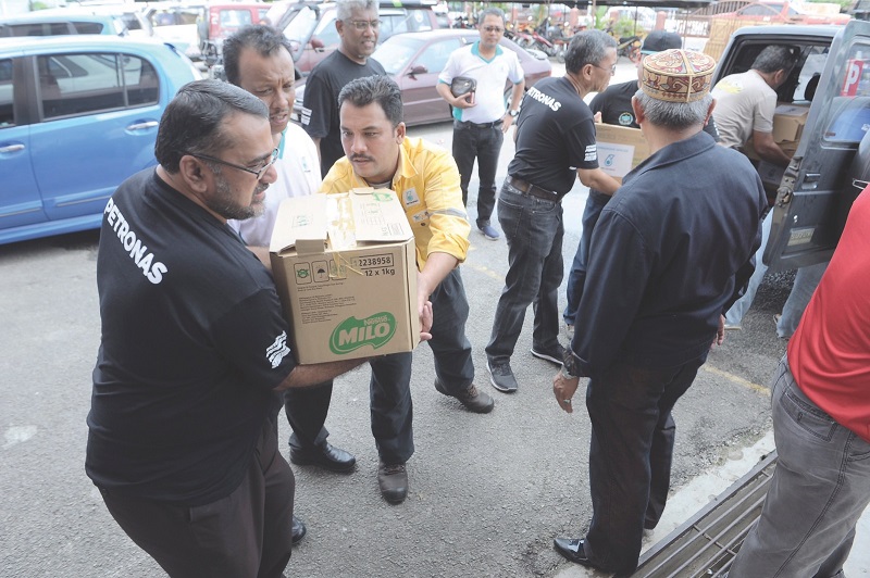 Misar volunteers were among the quickest to provide relief aid in Penang.