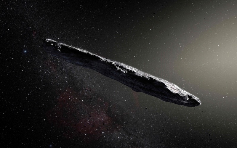 This handout photo released by the European Southern Observatory on November 20, 2017 shows an artist's impression of the first interstellar asteroid Oumuamua.u00c2u00a0u00e2u20acu201d Handout via AFP