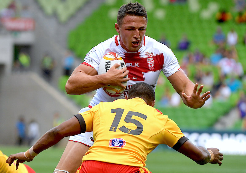 Papua New Guinea's Stargroth Amean prepares to tackle England's Sam Burgess during their quarter-final match in Melbourne, November 19, 2017. u00e2u20acu201d Picture by AAP/Joe Castro via Reuters