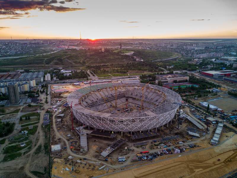 An aerial picture taken with a drone on June 20, 2017 shows the Volgograd Arena football stadium under construction for the 2018 Fifa World Cup, with the statue of Mother Homeland seen in the background, in Volgograd. u00e2u20acu201d AFP pic
