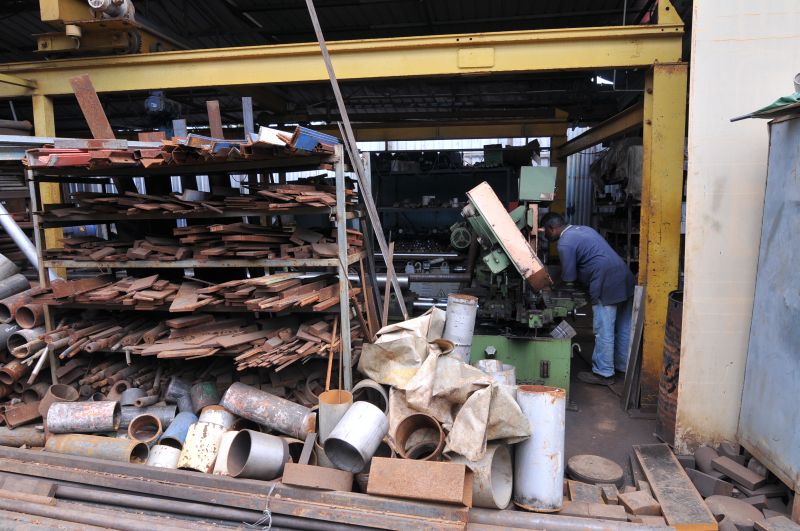 Rows of engine parts in an auto parts shop.