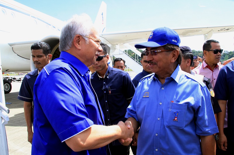 Prime Minister Datuk Seri Najib Razak is greeted by Sabah Chief Minister Datuk Seri Musa Aman upon his arrival at Kota Kinabalu November 18, 2017. u00e2u20acu201d Bernama pic