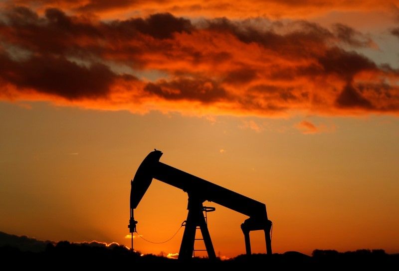 A oil pump is seen at sunset outside Scheibenhard, near Strasbourg. u00e2u20acu2022 Reuters pic