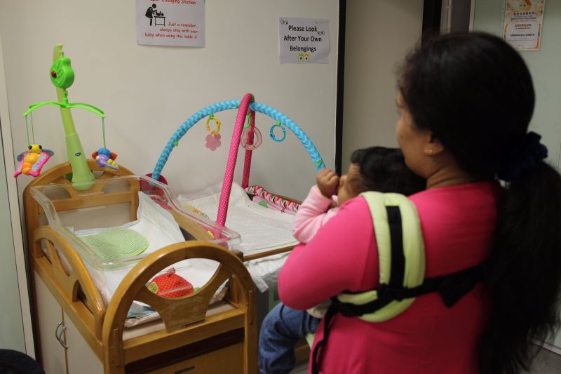 Indonesian domestic worker Anisa and her one-year-old daughter pose for a photo for the Thomson Reuters Foundation at PathFinders, a Hong Kong charity that supports pregnant foreign maids in Tai Kok Tsui, Hong Kong, u00e2u20acu2022 Reuters pic