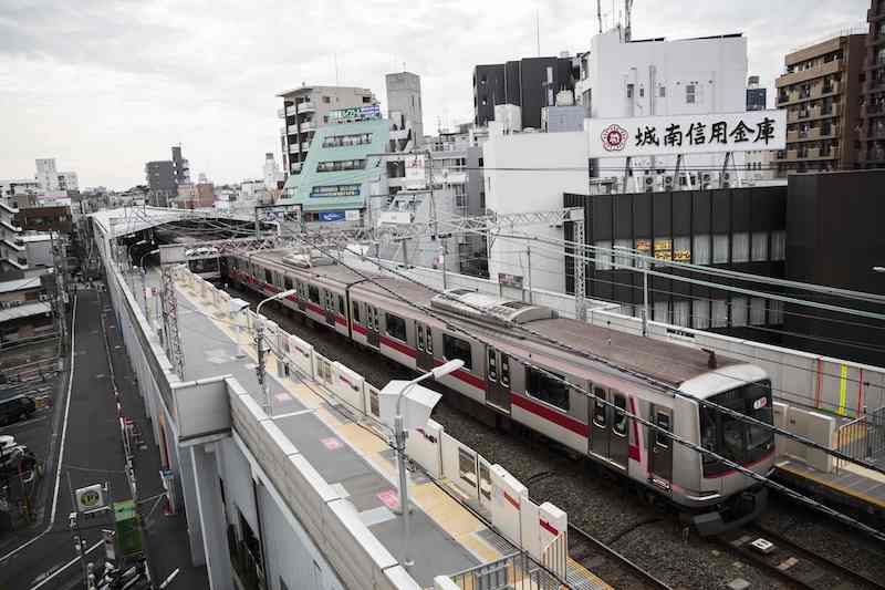 A Tokyu Toyoko line train stops at Toritsu-Daigaku station in southwestern Tokyo October 4, 2016. u00e2u20acu201d AFP pic
