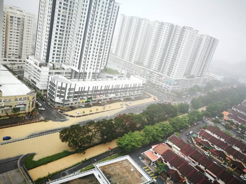 Areas in Bayan Baru flooded following hours of heavy rain in this photo shared via Whatsapp.