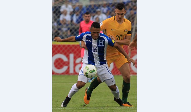 Trent Sainsbury of Australia and Alexander Lopez of Honduras in action during their 2018 World Cup qualifying playoffs at Olimpico stadium, San Pedro Sula, Honduras, November 10, 2017. u00e2u20acu201d Reuters pic