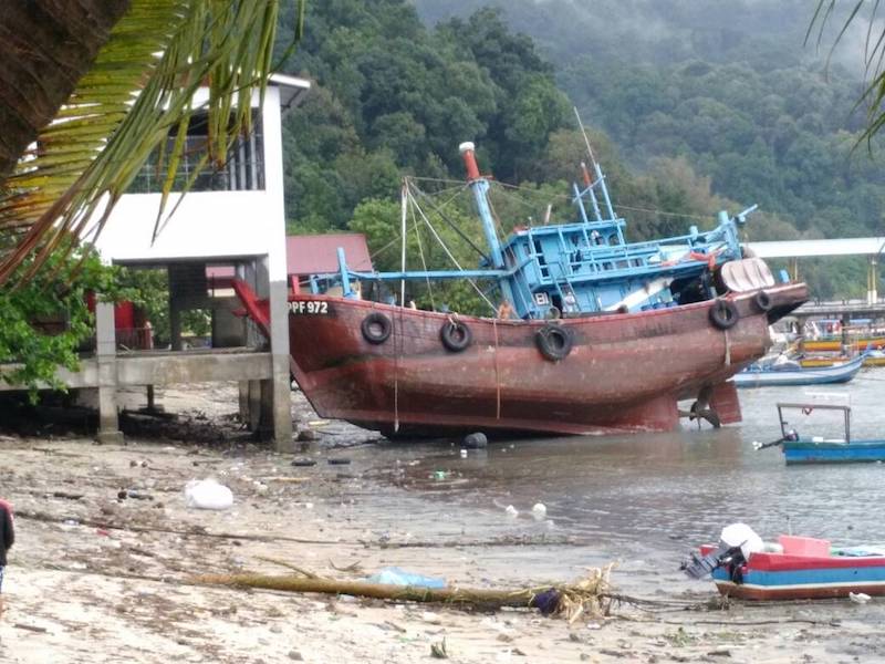In this photo shared via WhatsApp, stranded fishing boats are seen on Penangu00e2u20acu2122s northern coastline along Tanjung Bungah in George Town November 5, 2017.