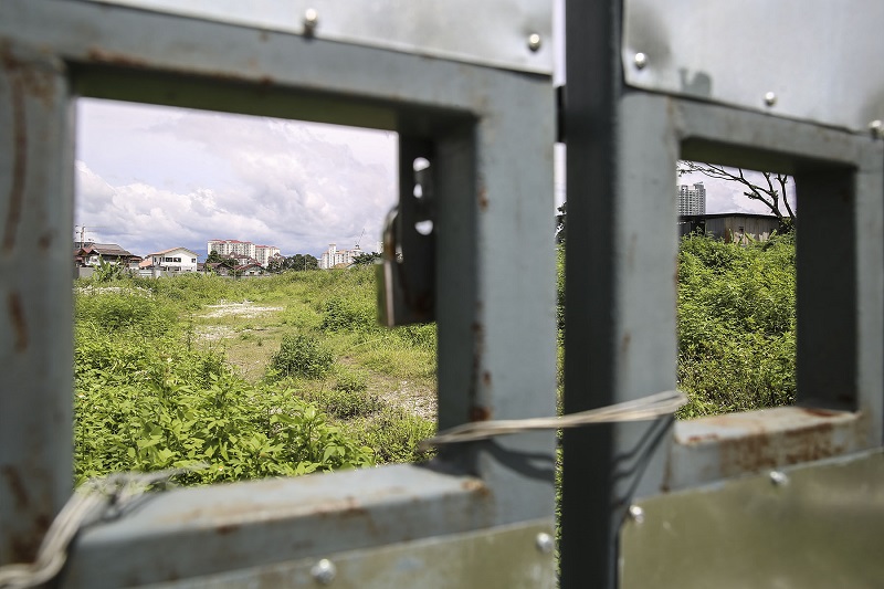 A view of the proposed project site in Taman Tiara Titiwangsa which has been hoarded up. u00e2u20acu201d Picture by Yusof Mat Isa