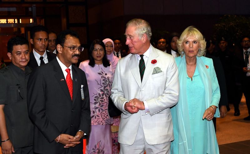 Datuk Seri SK Devamany greets Prince Charles and his wife Camilla at the Kuala Lumpur International Airport November 2, 2017. u00e2u20acu2022 Bernama pic