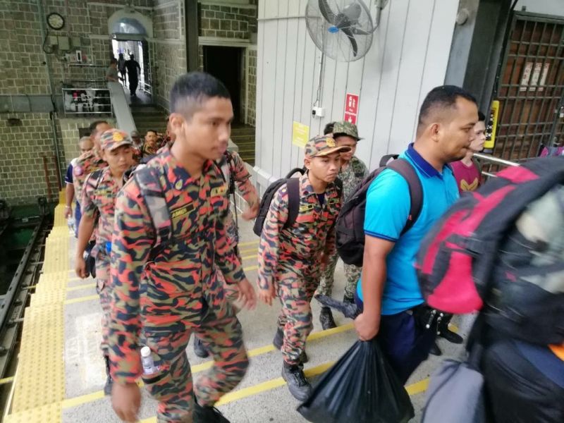Fire and Rescue Department personnel arriving at the Penang Hill lower station. u00e2u20acu2022 Pictures taken from Penang Hill Corporationu00e2u20acu2122s Facebook page