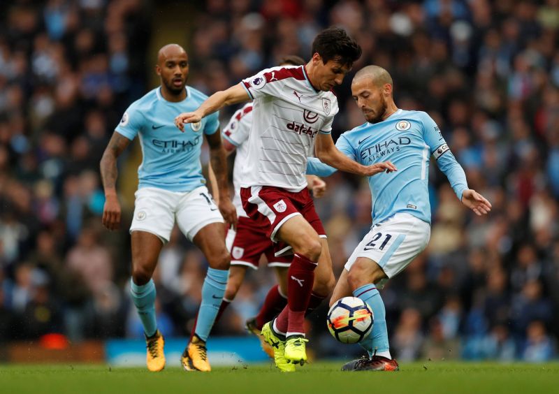 Midfielder Jack Cork (centre) has played every minute of Burnley's Premier League campaign this season having joined the club from Swansea City in the close season. u00e2u20acu2022 Reuters pic