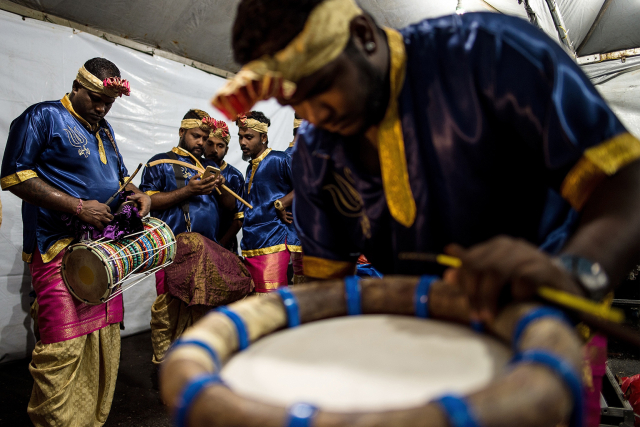 Malaysian musicians of Indian ethnicity preparing for an u00e2u20acu02dcurumee melamu00e2u20acu2122 performance in Bukit Sentosa. u00e2u20acu201d AFP pic
