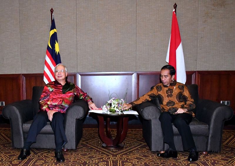 Prime Minister Datuk Seri Najib Razak meets with Indonesian President Joko Widodo before the start of the 12th Malaysia-Indonesia Annual Leadersu00e2u20acu2122 Consultation, in Kuching, November 22, 2017. u00e2u20acu201d Bernama pic