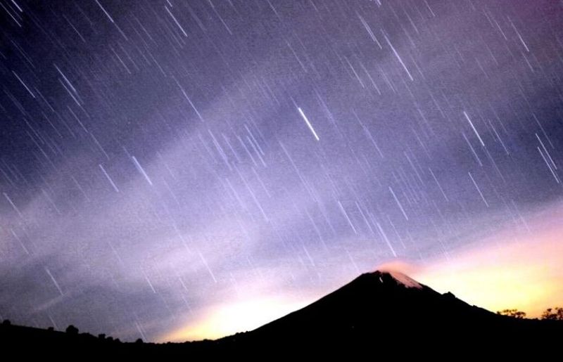 File picture shows a meteor shower lighting up the sky over the Mexican volcano Popocatepetl near the village San Nicolas de los Ranchos in the Mexican state of Puebla, December 14, 2004. u00e2u20acu201d Reuters pic