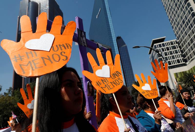 Demonstrators and relatives of women who were either murdered or disappeared take part in a march during in Mexico City November 25, 2017. — Reuters pic