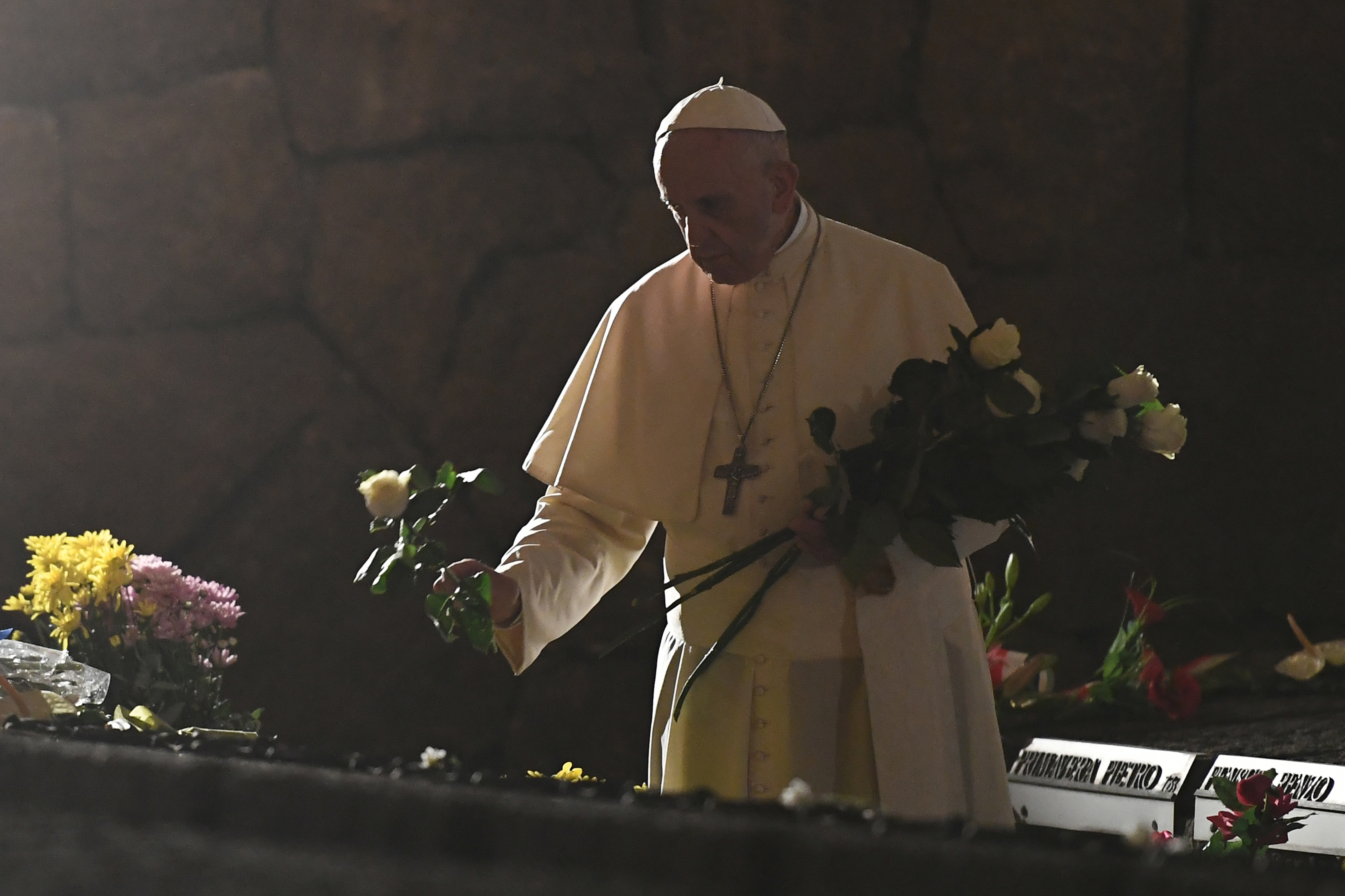 Pope Francis leaves white roses on the memorial, on November 2, 2017 in the Fosse Ardeatine (Ardeatine Caves), the site of a 1944 massacre carried out by German troops occupying Rome. u00e2u20acu201d AFP pic 