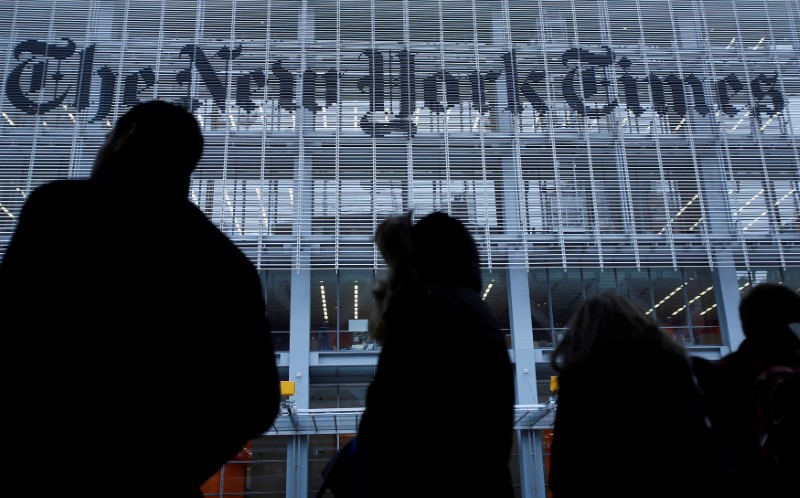 People line up for taxi across the street from the New York Times head office in New York February 7, 2013. u00e2u20acu201d Reuters pic