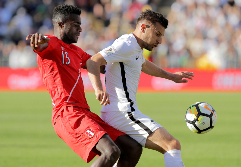 New Zealand's Kosta Barbarouses competes for the ball with Christian Ramos of Peru during their 2018 World Cup qualifying playoffs at Westpac Stadium, Wellington November 11, 2017. u00e2u20acu201d Reuters pic