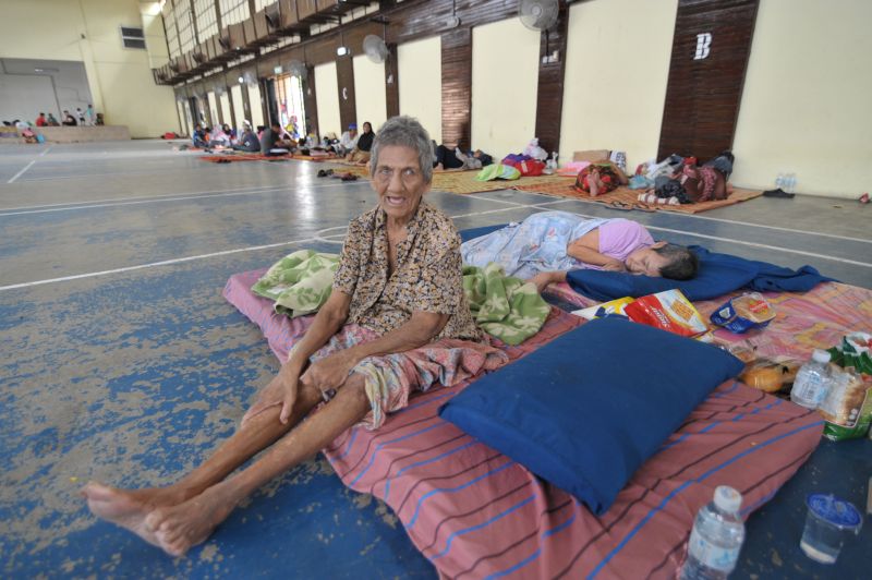 K. Letchumi, 73, lives alone and was evacuated early Sunday morning when flood waters rose in her home. — Picture by KE Ooi