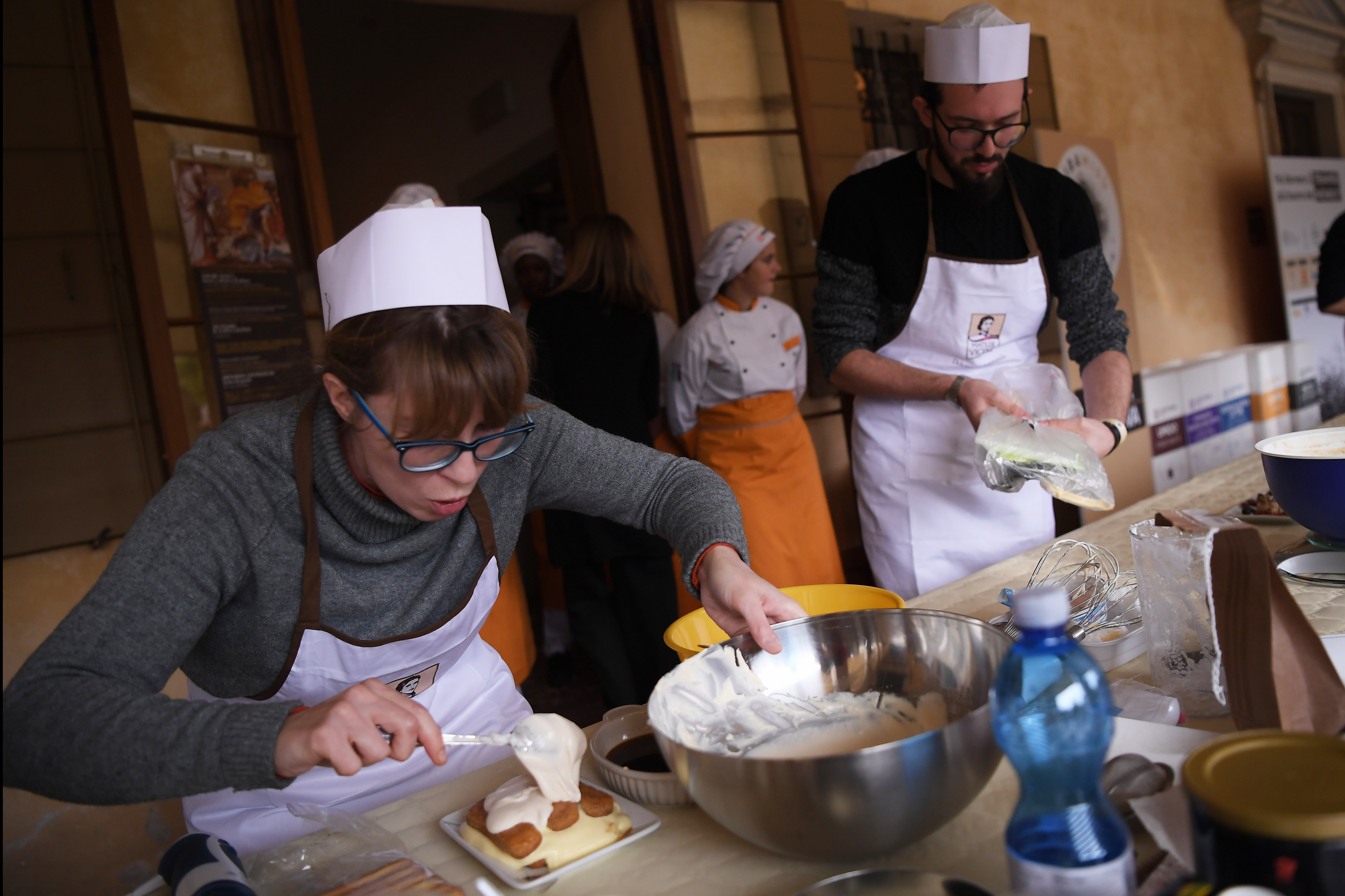 Competitors take part in the first Tiramisu World Cup competition on November 4, 2017 in Villa Emo in Vedelago, near Treviso. u00e2u20acu201d AFP pic