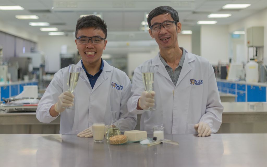 PhD student Chua Jian Yong (left) and Associate Professor Liu Shao Quan from NUSu00e2u20acu2122 food science and technology programme successfully turned tofu whey into a tasty alcoholic beverage which they named Sachi. u00e2u20acu201d Picture courtesy of NUSn