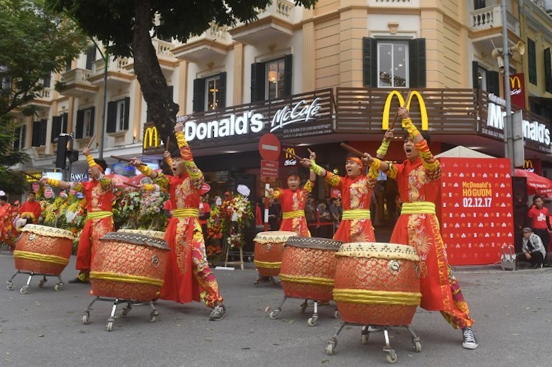 Performers beat drums during the opening ceremony of the first McDonaldu00e2u20acu2122s fast food chain restaurant in the capital Hanoi December 2, 2017. u00e2u20acu201d AFP pic