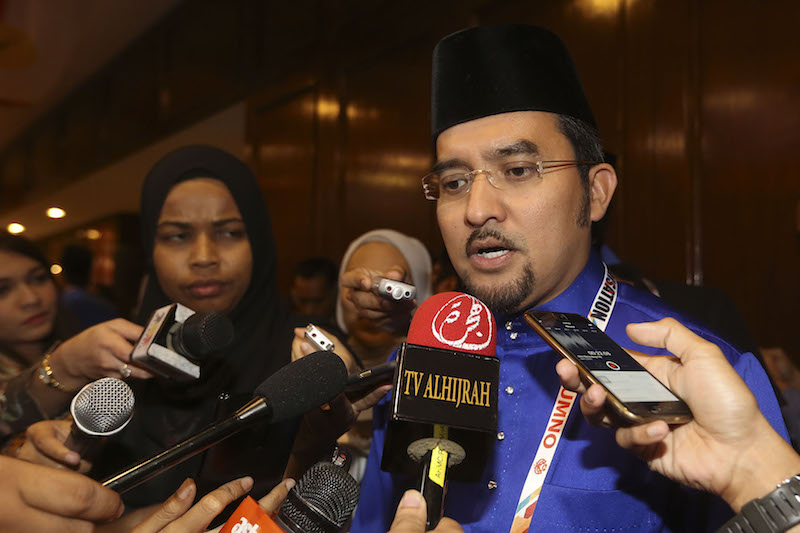 Umno Supreme Council member Datuk Dr Asyraf Wajdi Dusuki speaks to journalists outside the Merdeka Hall after the end of the 71st Umno General Assembly at Putra World Trade Centre in Kuala Lumpur, December 9, 2017. u00e2u20acu201d Picture by Yusof Mat Isa