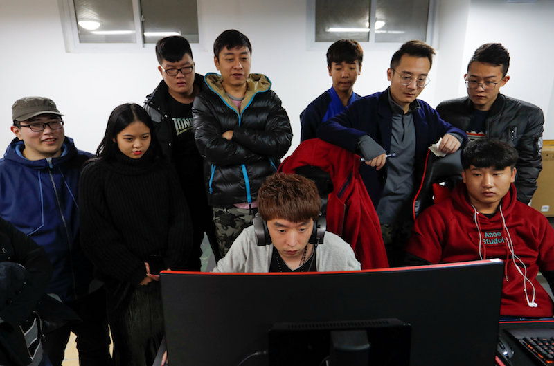 Students watch demonstration by a professional e-sports player during a class of the eSports and management course at the Sichuan Film and Television University in Chengdu, Sichuan province, November 17, 2017. — Reuters pic
